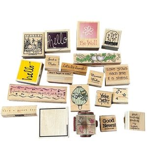 Lot of 20 rubber stamps. Most of the stamps are brand new.